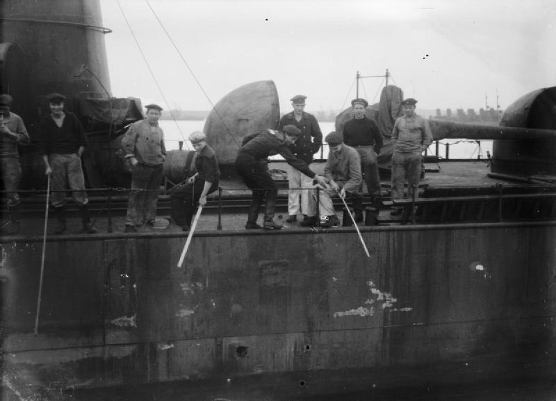 German sailors fishing from a destroyer in Scapa Flow.1919 Wikipedia