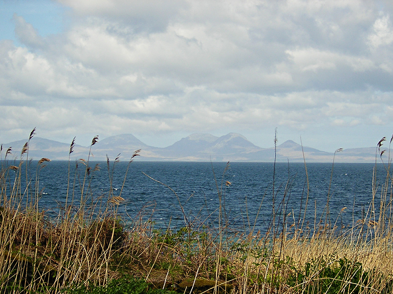 View of the Paps of Jura from the Kintyre road © 2004 Scotiana