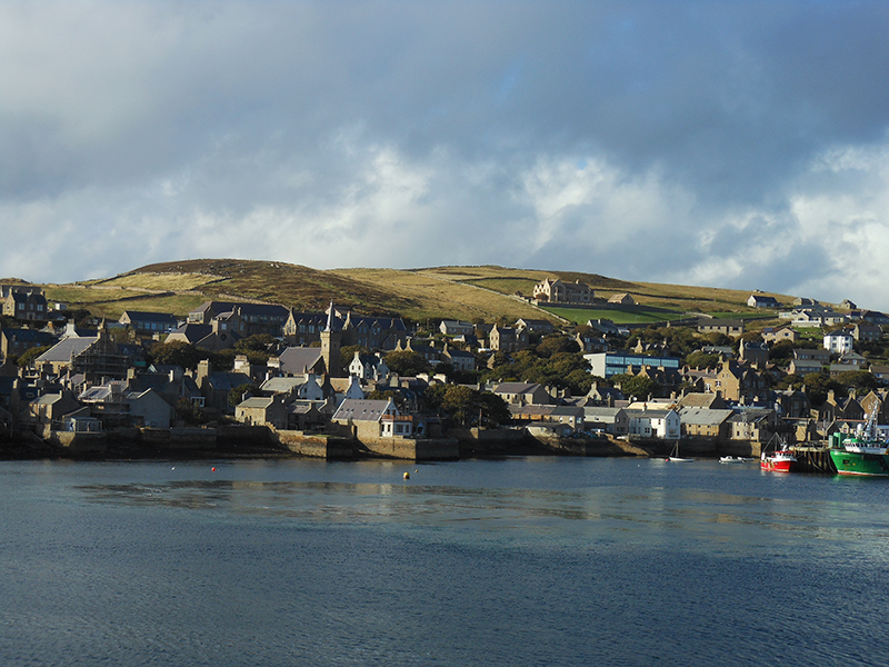 Stromness harbour and Brinkie Brae as seen  from the departing ferry © 2012 Scotiana