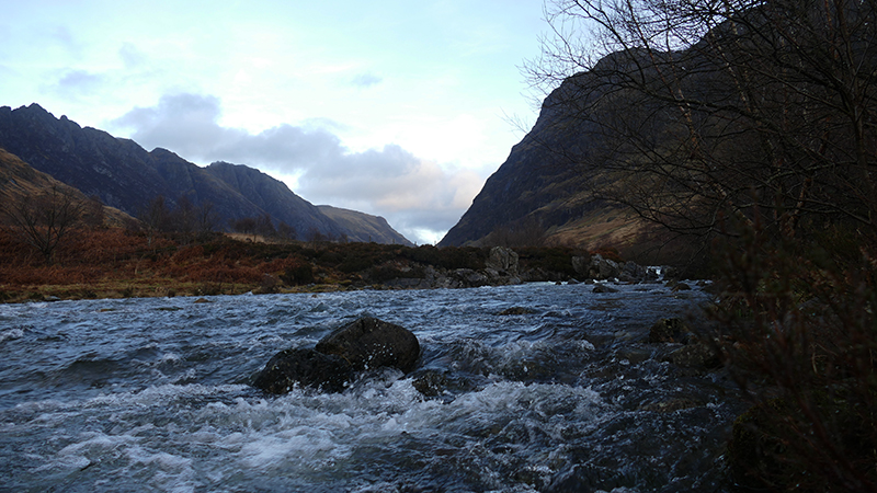 The tumultuous waters of River Coe in winter on Glencoe Woodland Path © 2019 Scotiana